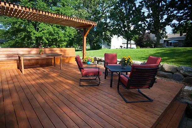 Backyard deck and pergola landscaping.