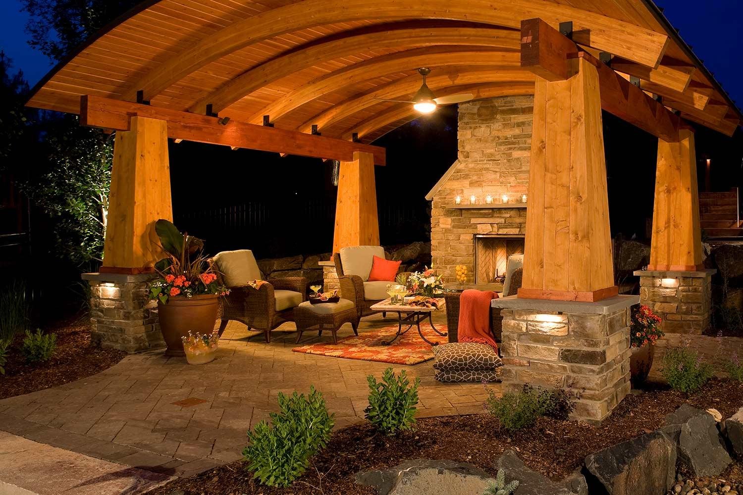 outdoor_room_with_fireplace_and_arching_ceiling_1.7564b97da12bbd373bba858654c78fec